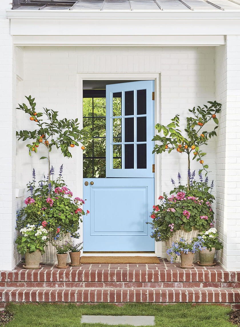 Bold front door colors Blue Skies from Southern Living magazine with terracotta pots